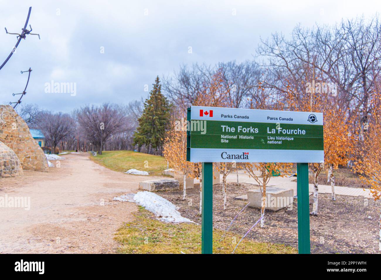 April 15 2023 Winnipeg Manitoba Canada Parks canada sign at the entrance of the forks Stock