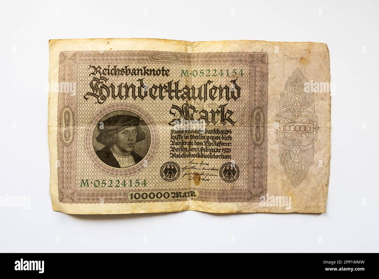 Hunderttausend Mark (one hundred thousand Mark) banknote of the German Reichsbank from 1923. Old money during the hyperinflation in Germany. Stock Photo