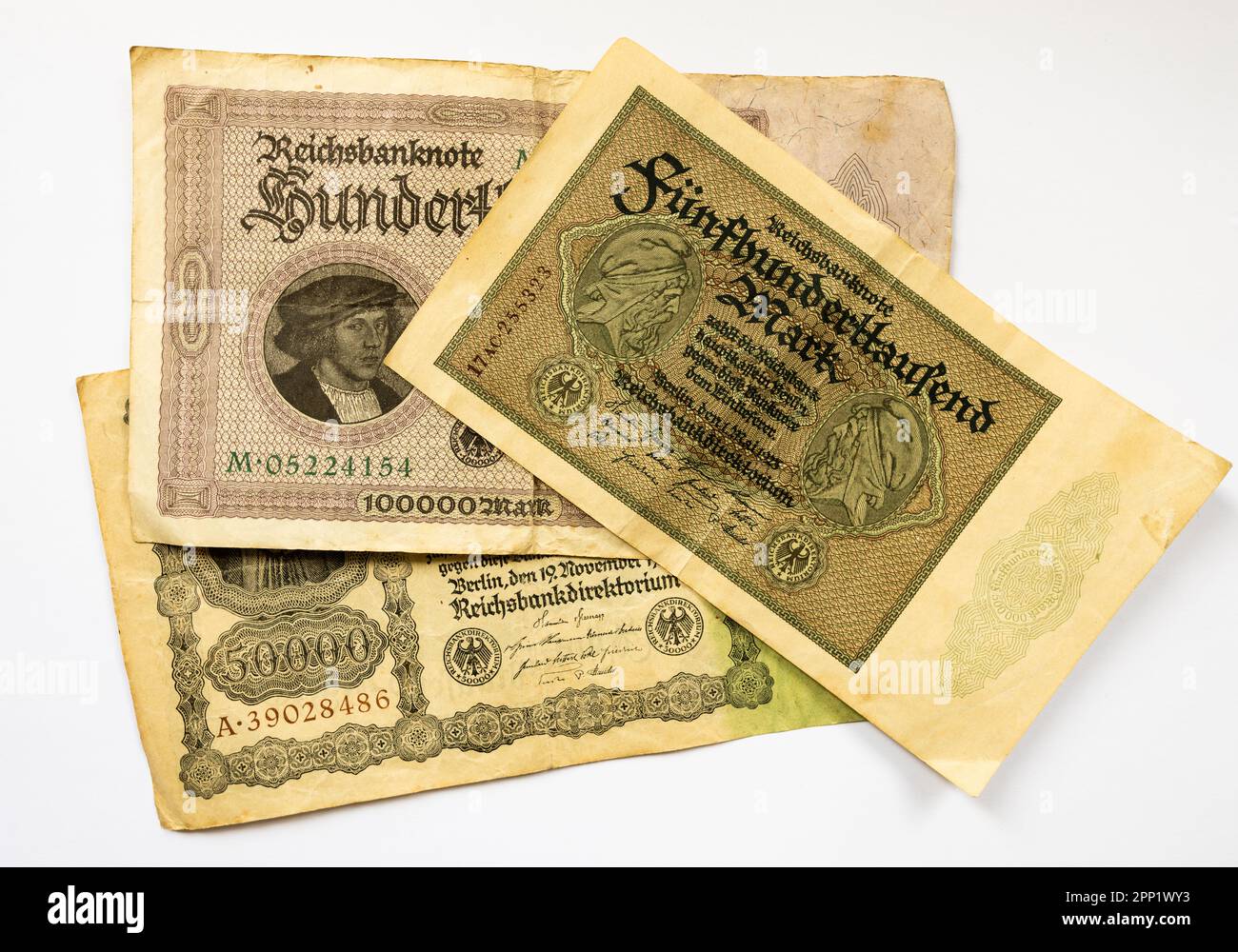 Banknotes of the inflation in 1923 in Germany. Old money from the Reichsbank lying around. Historical currency during a big recession. Stock Photo