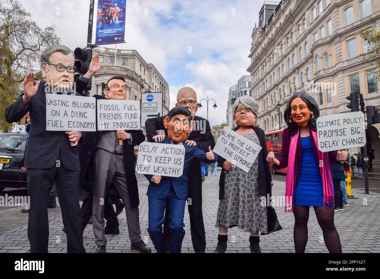 Protesting Uk London, UK. 21st April 2023. Protesters wearing masks of Rupert Murdoch ...