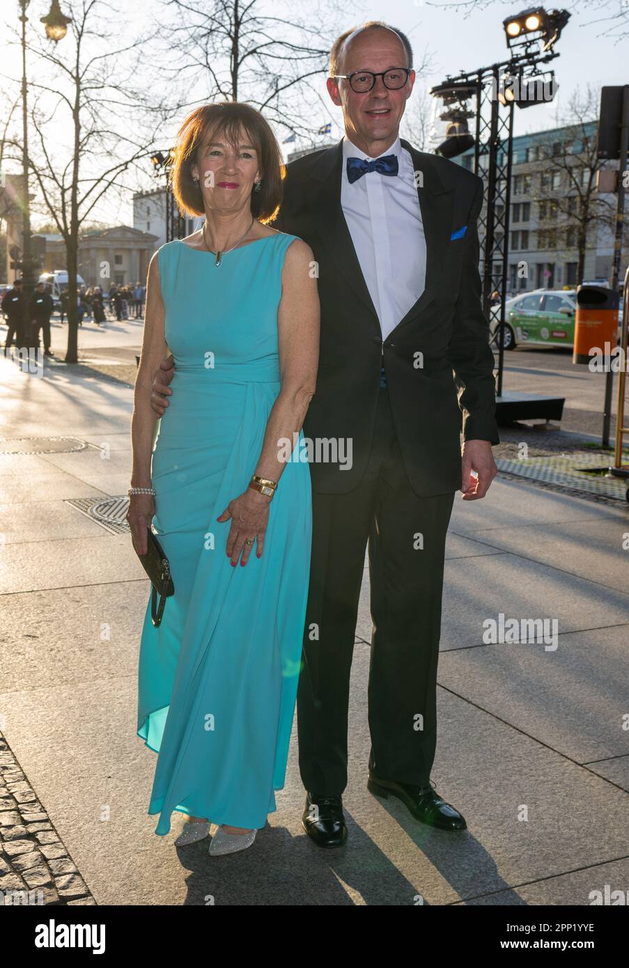 Berlin, Germany. 21st Apr, 2023. Friedrich Merz, Federal Chairman of the CDU, and his wife Charlotte Merz come to the 70th Federal Press Ball 'For Freedom of the Press' at the Hotel Adlon Kempinski. In the future, the motto of the ball will be 'For freedom of the press' - the focus this year is on Iran, where democracy and a free press are being suppressed. Credit: Monika Skolimowska/dpa/Alamy Live News Stock Photo