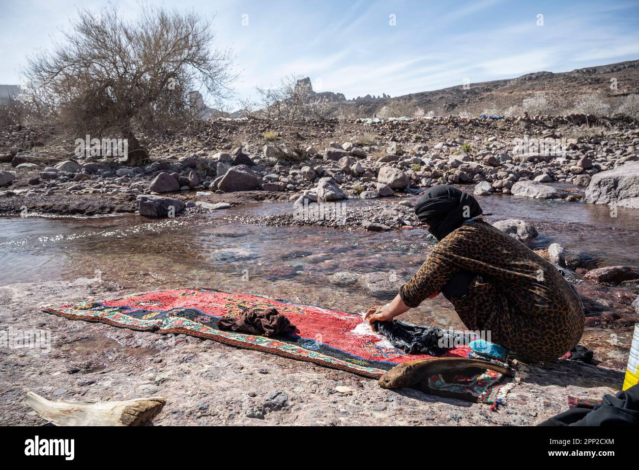Woman washing clothes by hand hi-res stock photography and images - Alamy