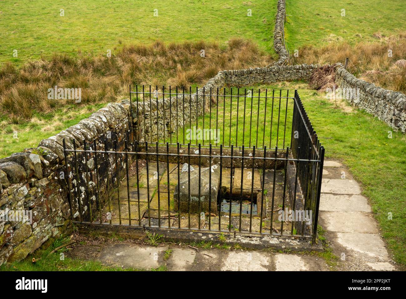 Mompessons Well a natural spring in the hills above the Plague village of Eyam Derbyshire Stock Photo