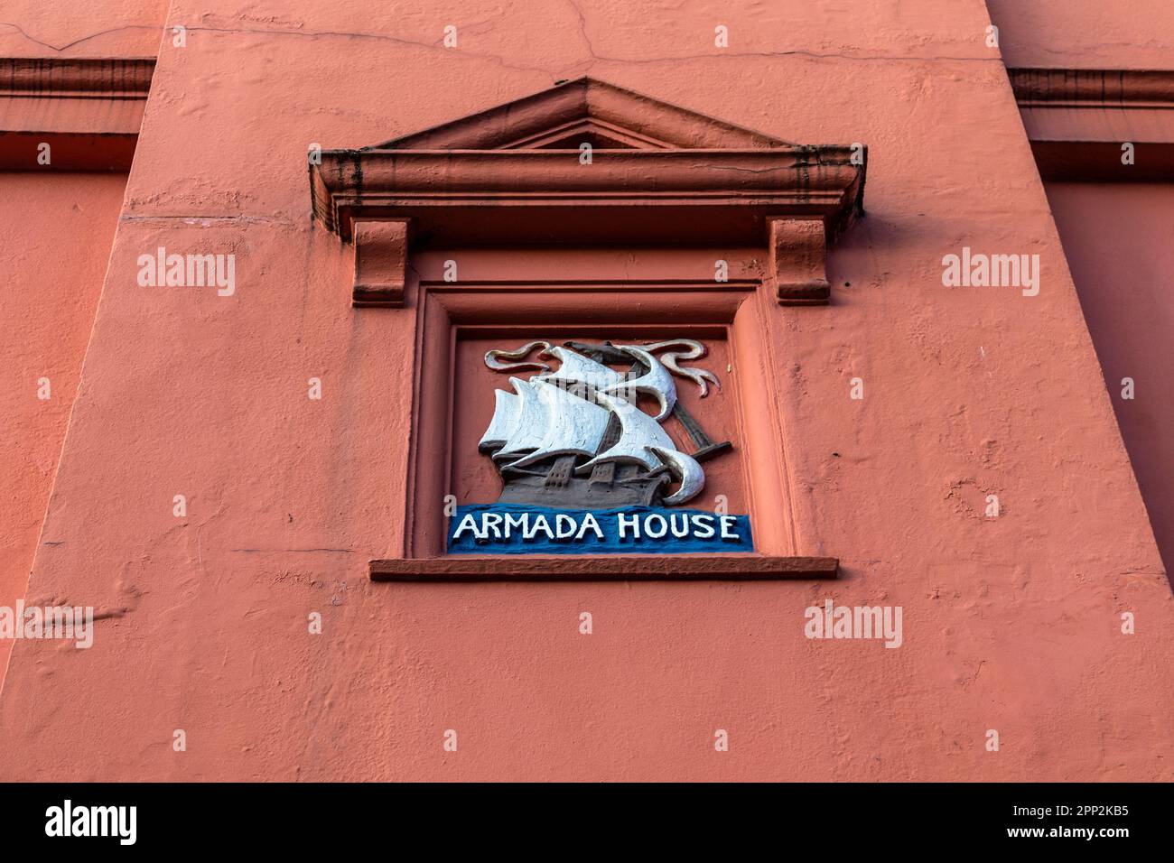 Plaster relief carving of a 16th-century ship on the facade of Armada House (Garsett House) featuring a Georgian doorway, Norwich, Norfolk, England, U Stock Photo