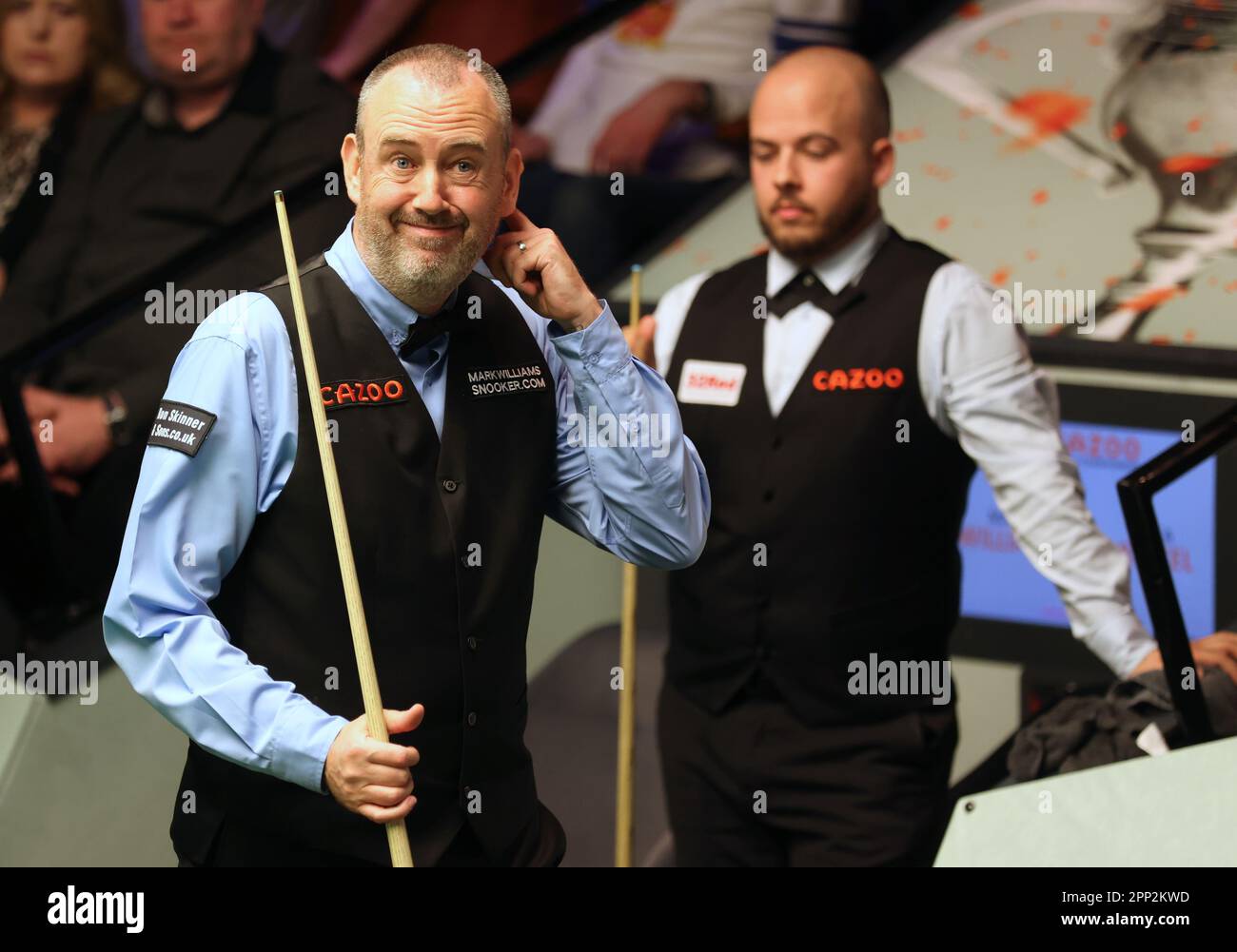 Mark Williams (left) and Luca Brecel during day seven of the Cazoo