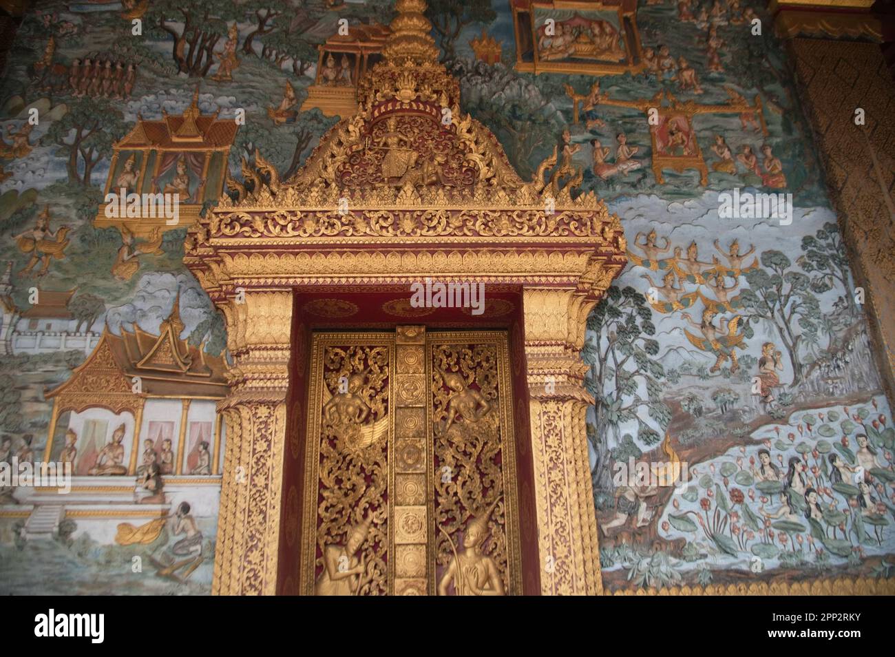 Entrance door with beautiful sculpture and stucco at Sim or Church architecture of Lan Xang style, there is a mural at Wat Mahathat or Wat That Noi '. Stock Photo