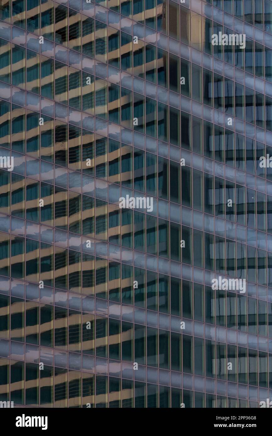 Abstract images of tall modern office towers reflected in glass facades. Hamamatsucho, Tokyo, Japan. Stock Photo