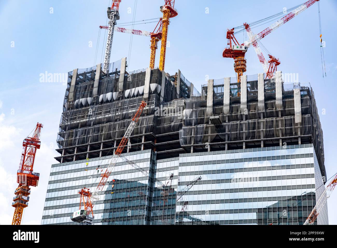 Osaka Japan construction building site with tower cranes on high rise building under development,Japan,Asia 2023 Stock Photo