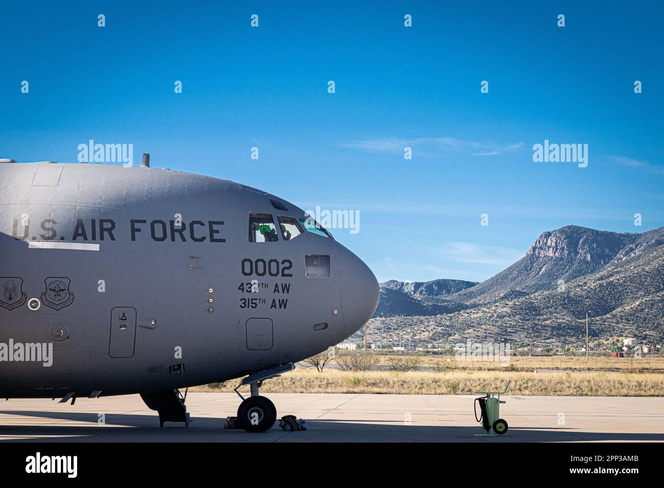 A U.S. Air Force C-17 Globemaster III aircraft assigned to the 16th Airlift Squadron, sits on the flight line of the Advanced Airlift Tactics Training Center, while attending the Advanced Tactics Airlift Course at Fort Huachuca, Arizona, April 18, 2023. The mission of the AATTC is increasing the warfighting effectiveness and survivability of mobility forces. Since 1983 the AATTC has provided advanced tactical training to mobility aircrews from the Air National Guard, Air Force Reserve Command, Air Mobility Command, Air Combat Command, Air Force Special Operations Command, United States Marine Stock Photo