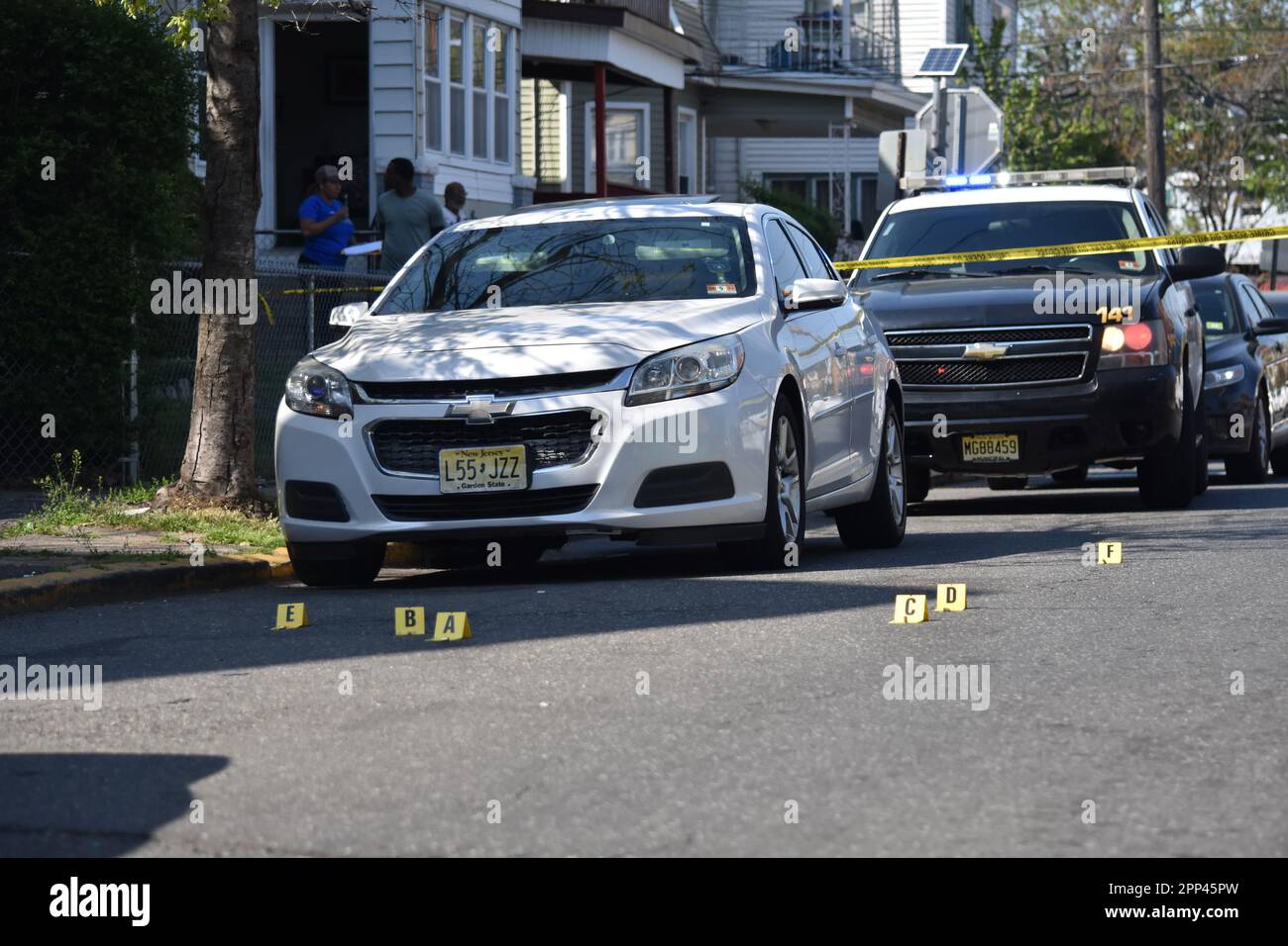 Evidence markers at the shooting incident. Shooting near 14th Avenue in
