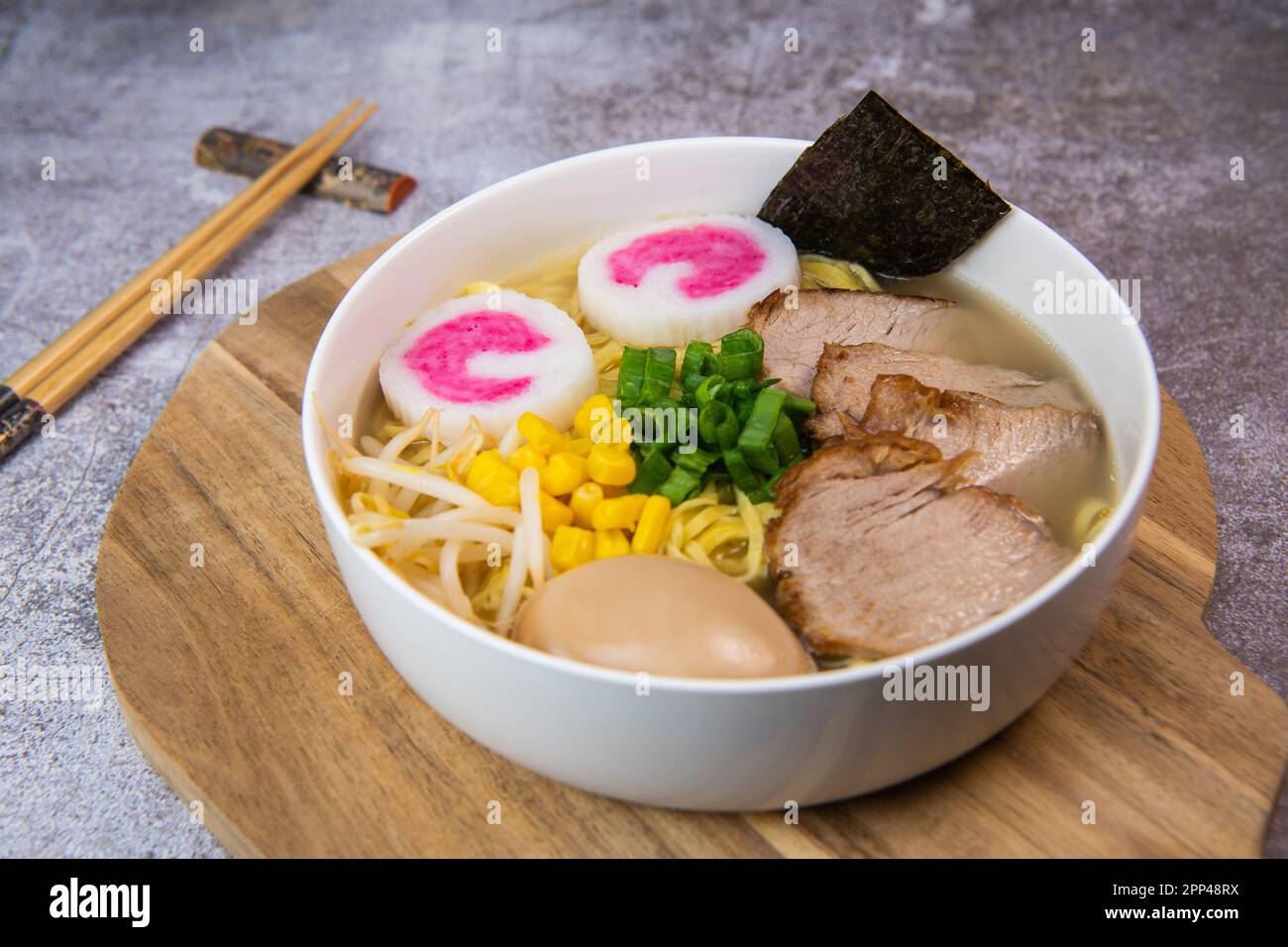 Fresh ramen noodles with garnish, pork tenderloin, eggs marinated in Mirin  and soy sauce, bean sprouts, corn, nori leaf, spring onion, and homemade  Stock Photo - Alamy