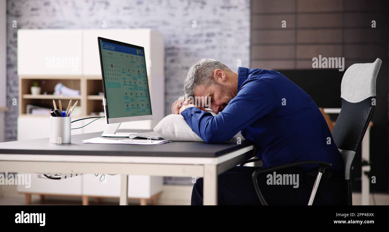 Bored Boss Man Sleeping. Restful Tired Employee Stock Photo - Alamy