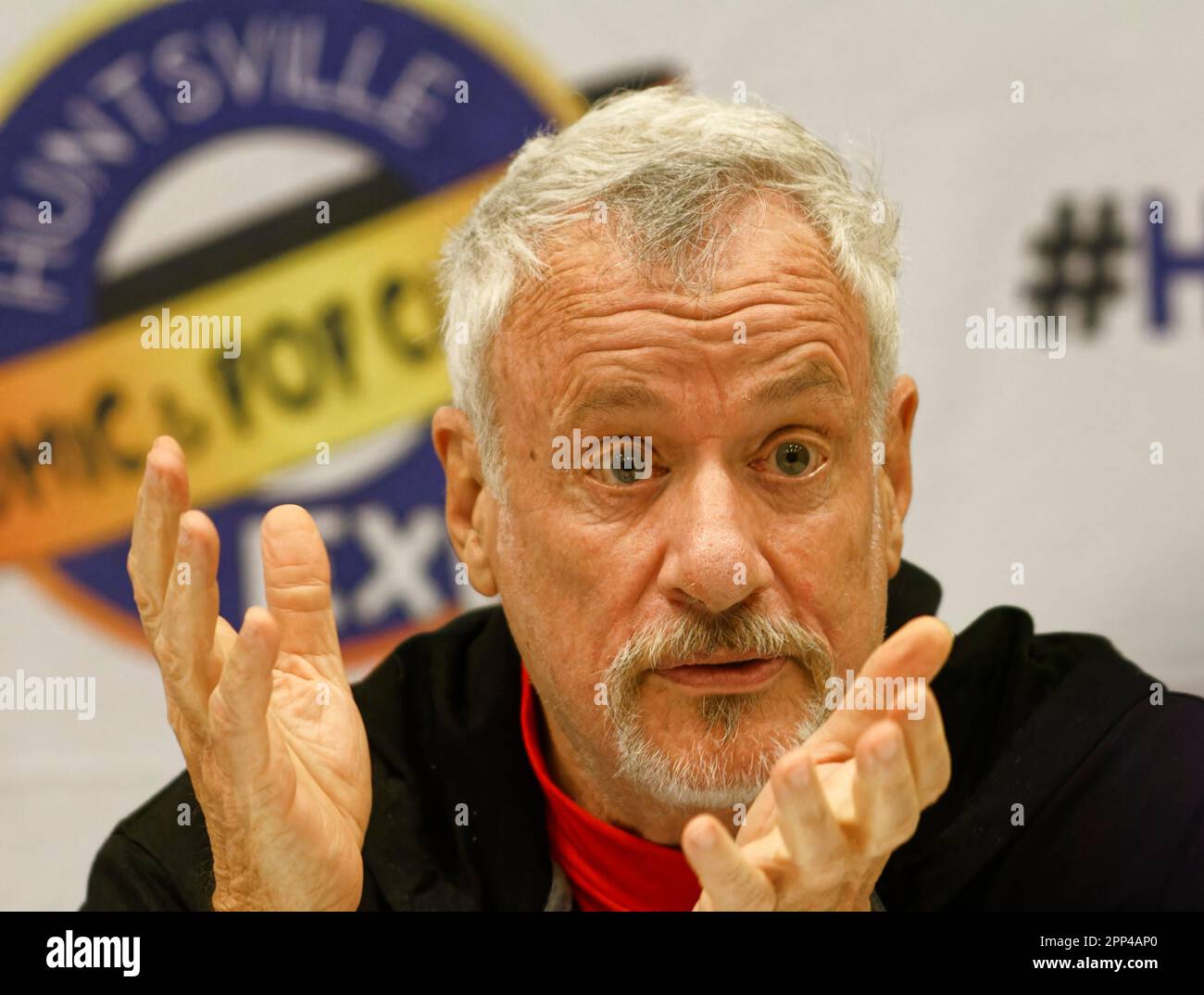 Huntsville, Alabama, USA. 21 Apr 2023. Star Trek actor John de Lancie speaks during a Star Trek: The Next Generation panel on the first day of the 2023 Huntsville Comic & Pop Culture Expo on Friday, April 21, 2023 at the Von Braun Center in Huntsville, Madison County, AL, USA. De Lancie, 75, most recently reprised his role as 'Q' in the Star Trek: Picard series finale which premiered the day before this appearance. (Credit: Billy Suratt/Apex MediaWire via Alamy Live News) Stock Photo