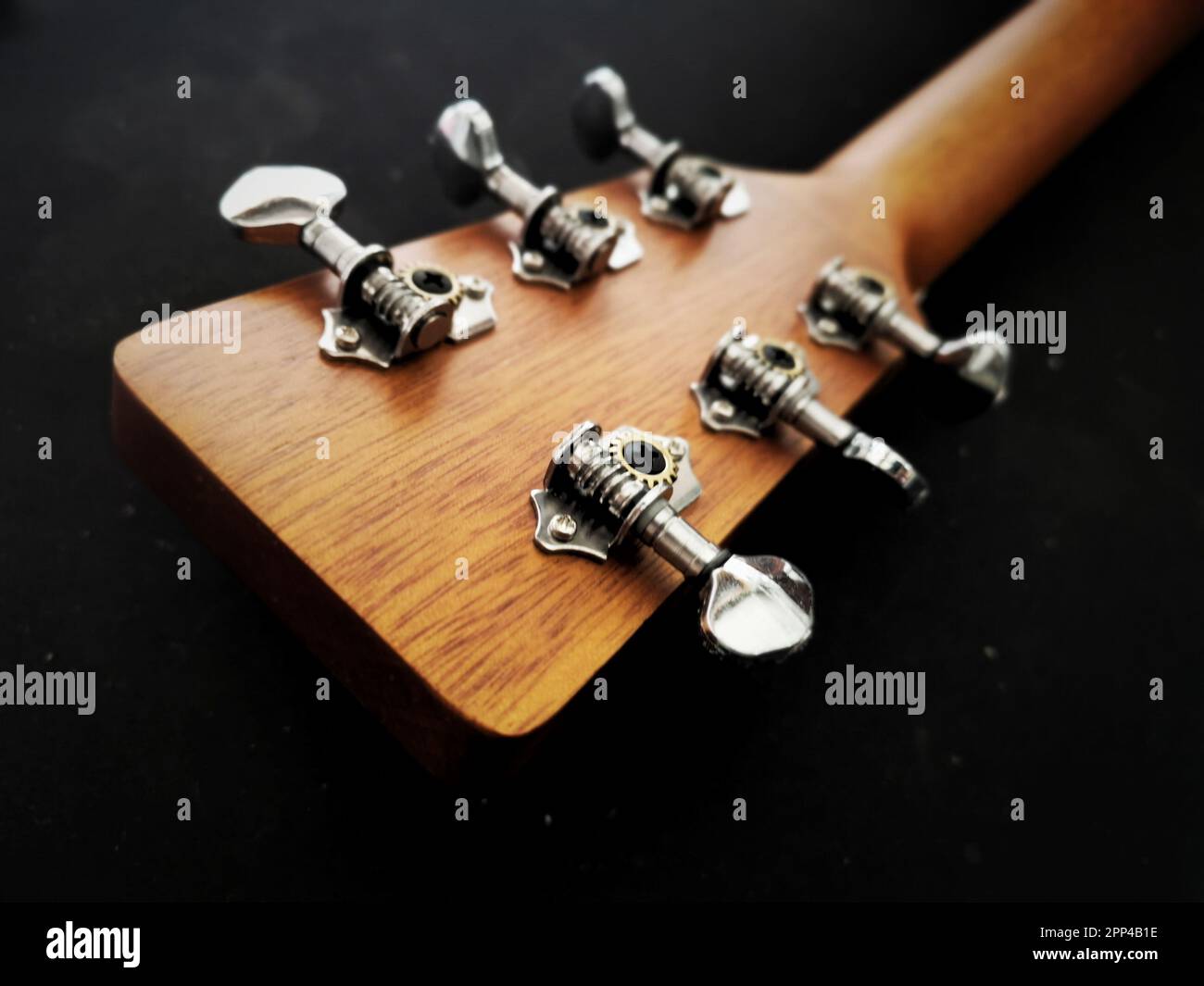 close up shot of acoustic guitar tuning machine, open gear Stock Photo ...