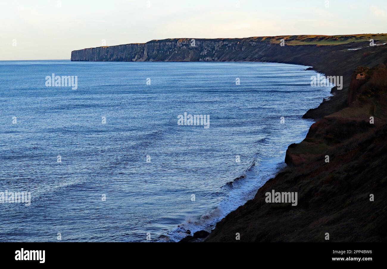 Hunmanby Sands, and Hunmanby Bay on a spring evening with tide and the low sun highlighting the