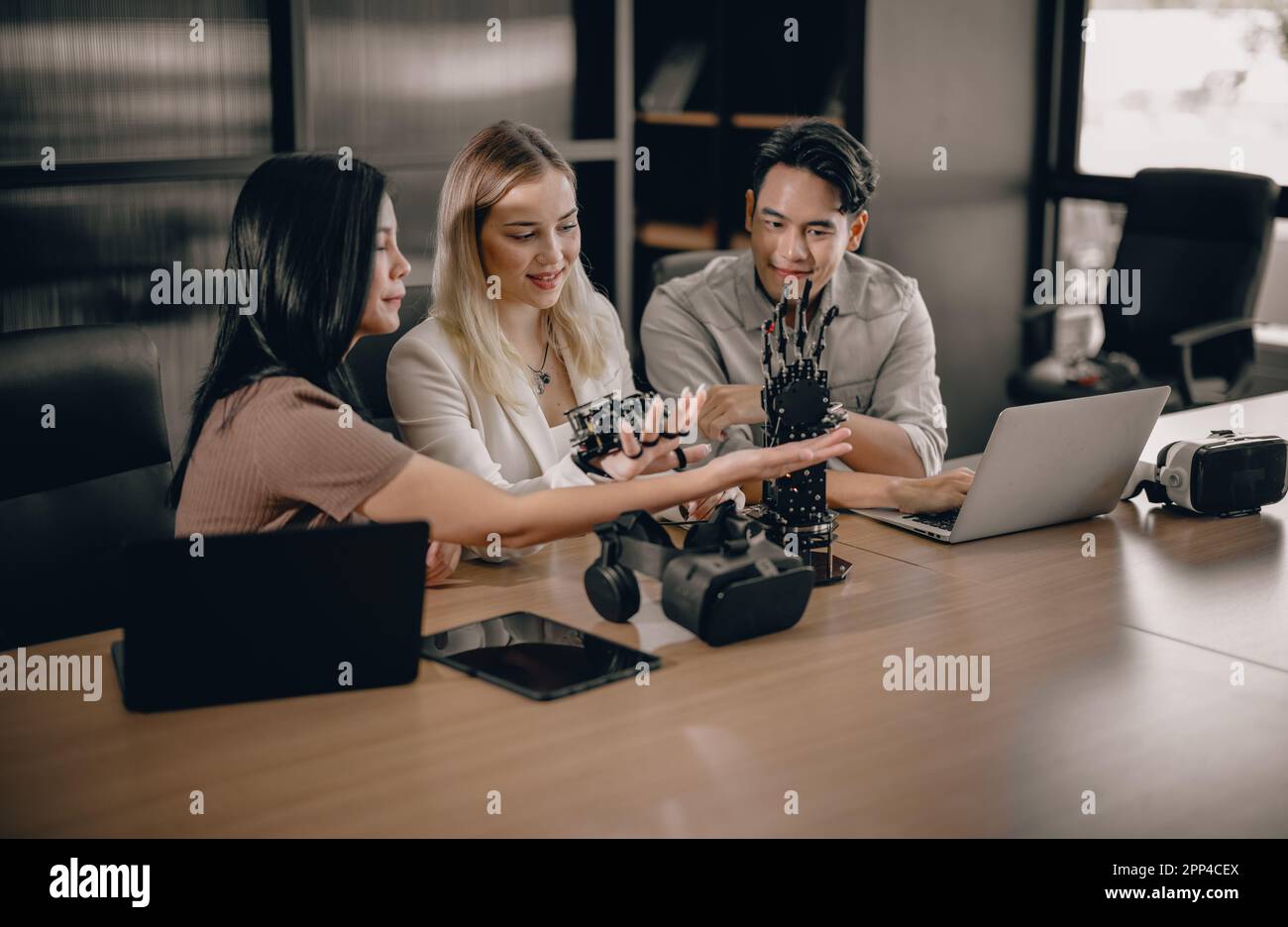 College students join research group to do experiments with educational robot. Learn to combine engineering, programming, problem solving, and creativ Stock Photo