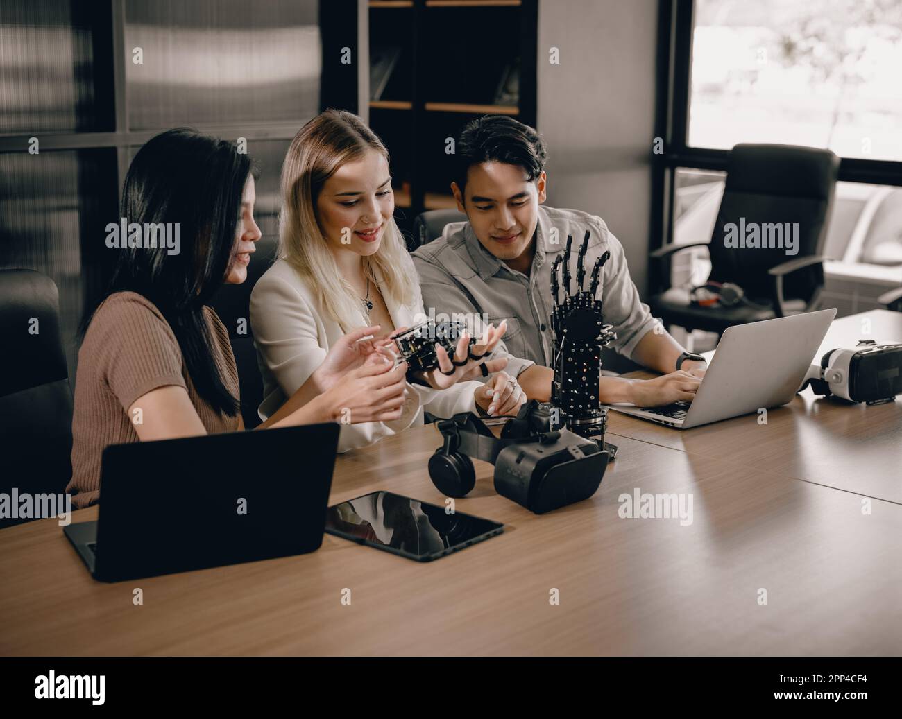 College students join research group to do experiments with educational robot. Learn to combine engineering, programming, problem solving, and creativ Stock Photo