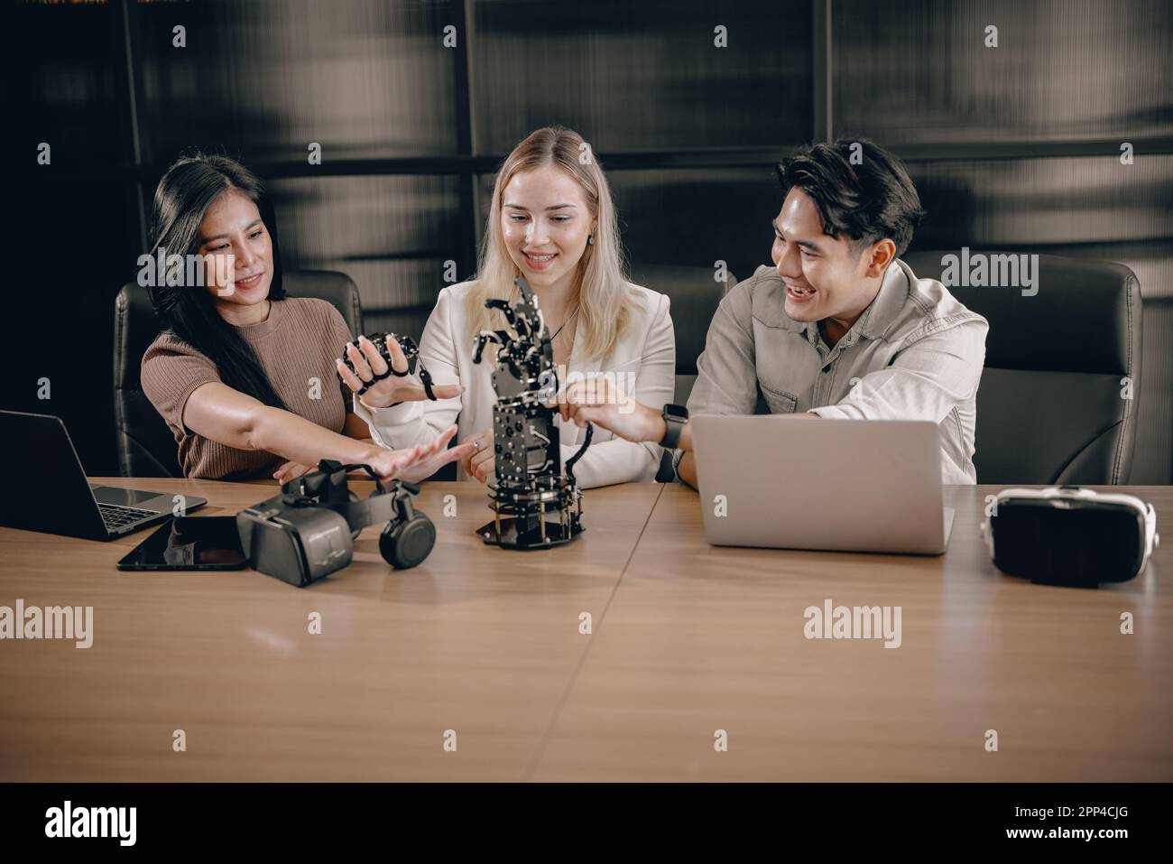 College students join research group to do experiments with educational robot. Learn to combine engineering, programming, problem solving, and creativ Stock Photo