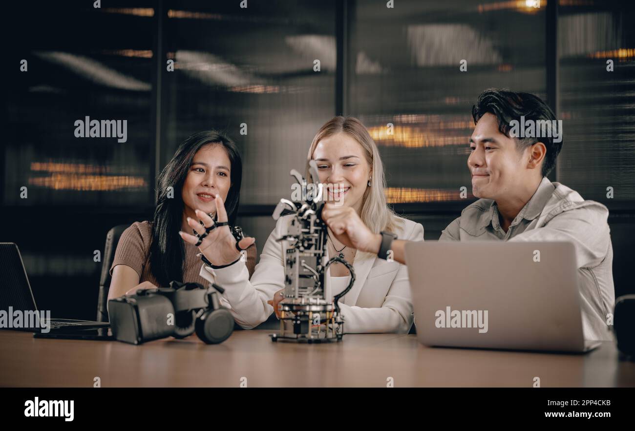 College students join research group to do experiments with educational robot. Learn to combine engineering, programming, problem solving, and creativ Stock Photo