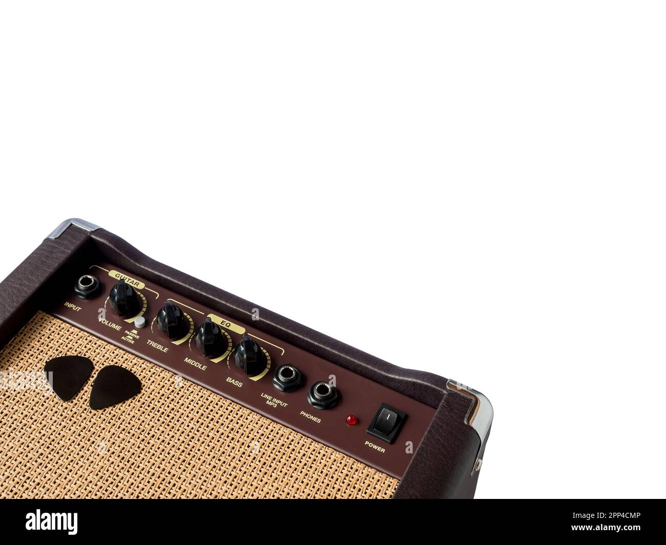 Small acoustic guitar amplifier with pick guitar on amplifier mask, isolated on white background