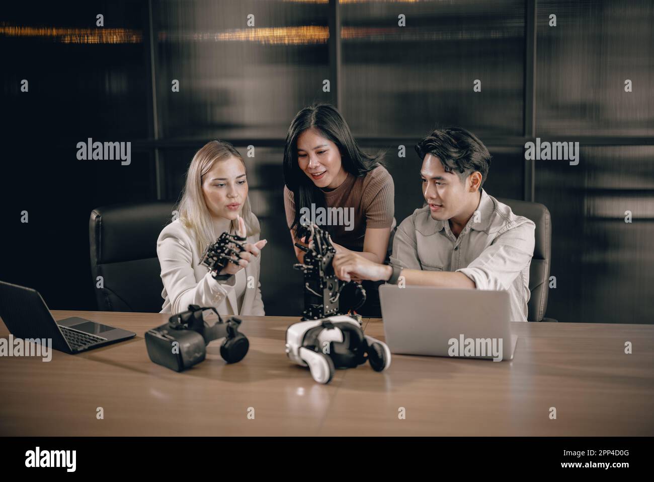 College students join research group to do experiments with educational robot. Learn to combine engineering, programming, problem solving, and creativ Stock Photo
