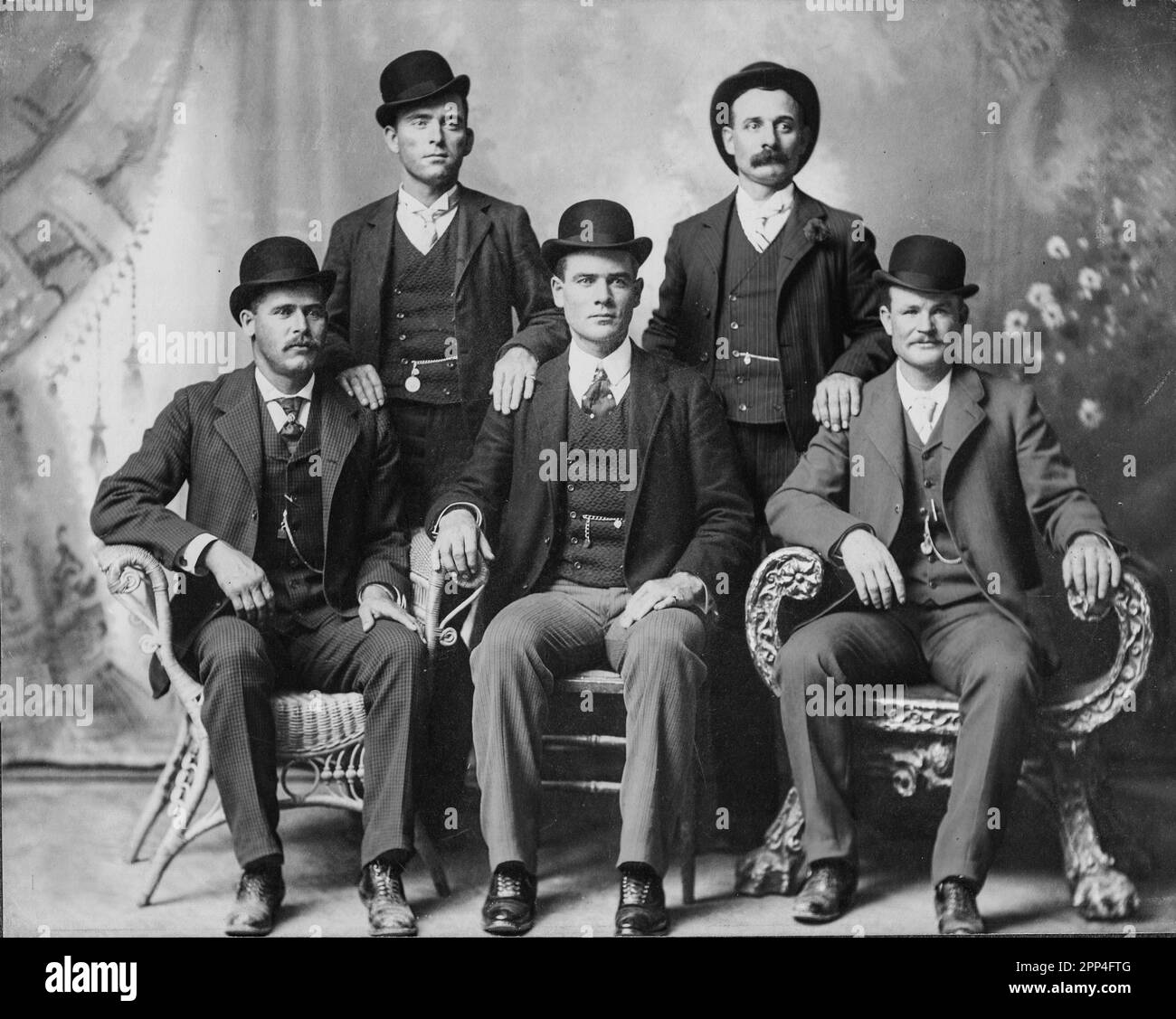 Front row left to right: Harry A. Longabaugh, alias the Sundance Kid, Ben Kilpatrick, alias the Tall Texan, Robert Leroy Parker, alias Butch Cassidy; Stock Photo
