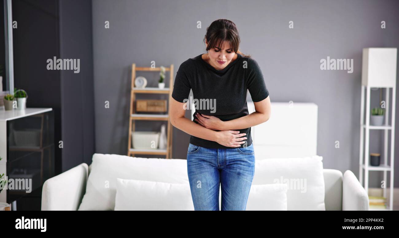 Women With Stomach Ache. Diarrhea Or PMS Pain Stock Photo Alamy