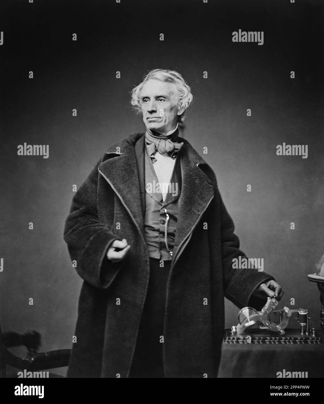 Samuel Morse with His Recorder. Date 1857. Medium salted paper print