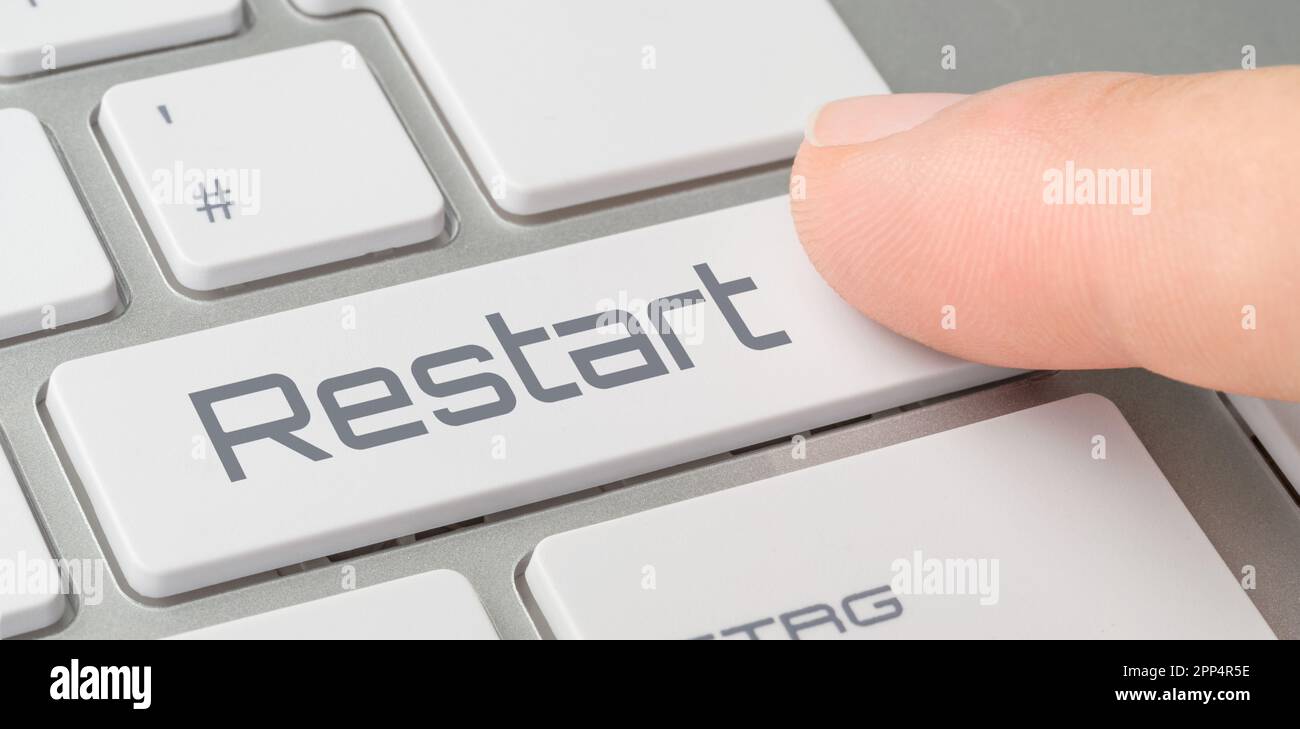 A keyboard with a labeled button Restart Stock Photo Alamy