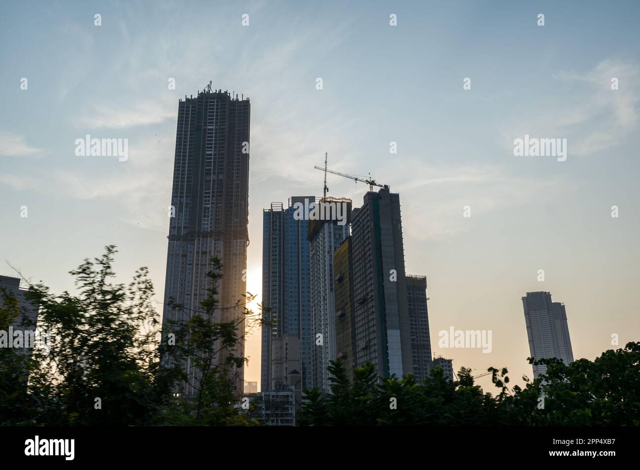 Modern City High Rise Skyscraper Buildings During Sunset Time In Mumbai Modern City High Rise Skyscraper Buildings During Sunset Time In Mumbai