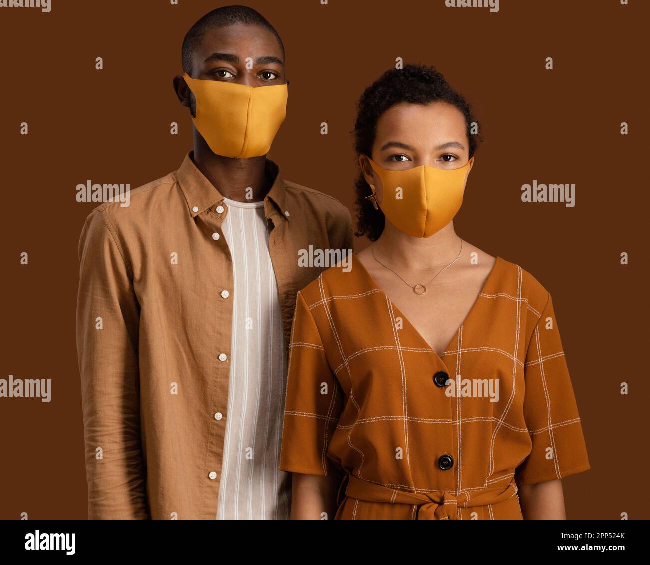 Front view couple with face masks Stock Photo Alamy