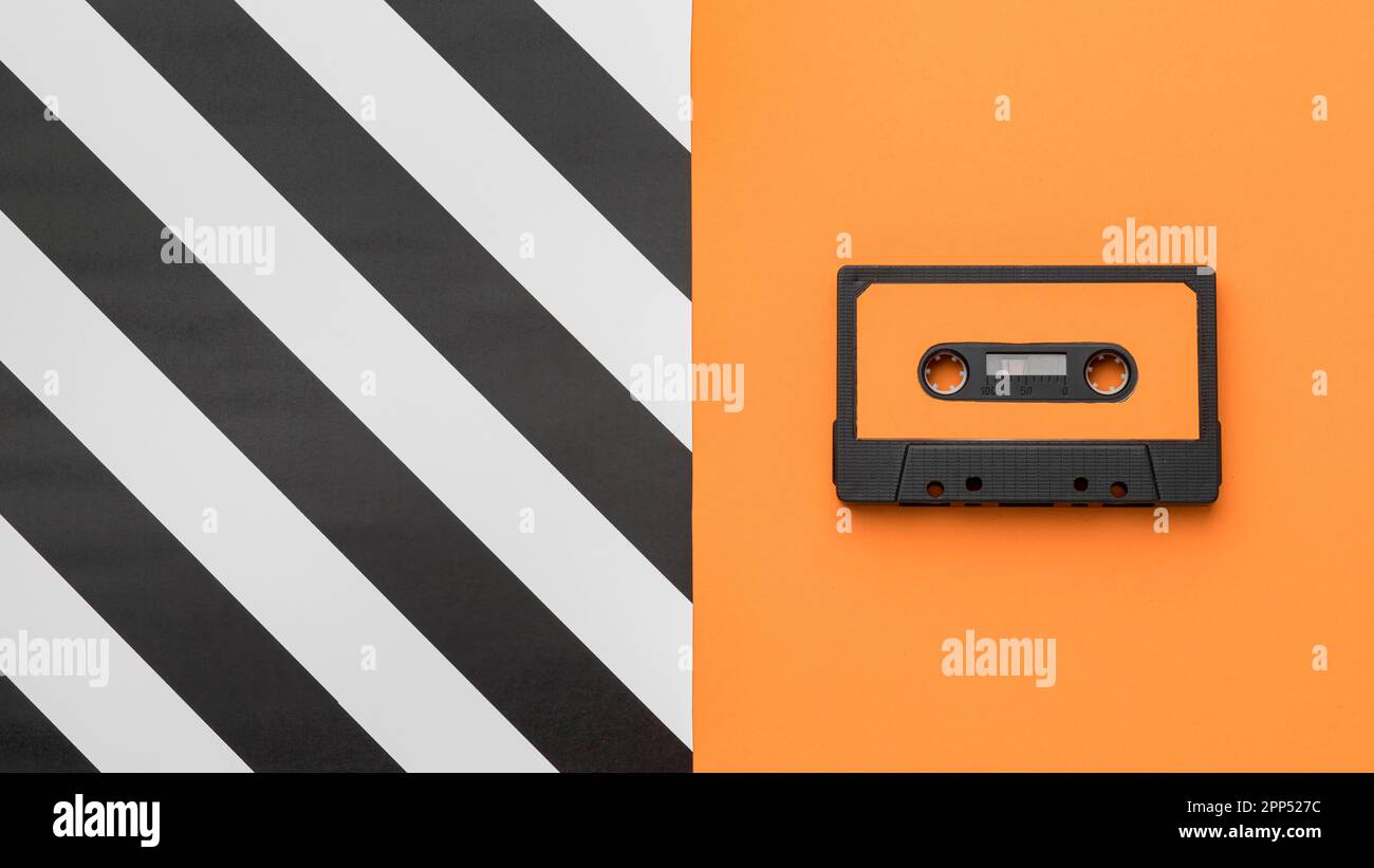 Vintage cassette tape orange striped background Stock Photo