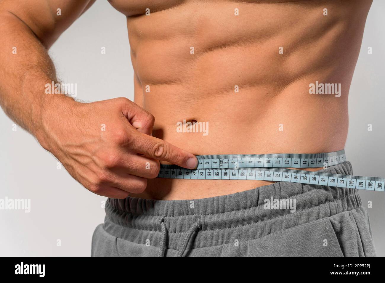 Waist measuring tape hi-res stock photography and images - Alamy