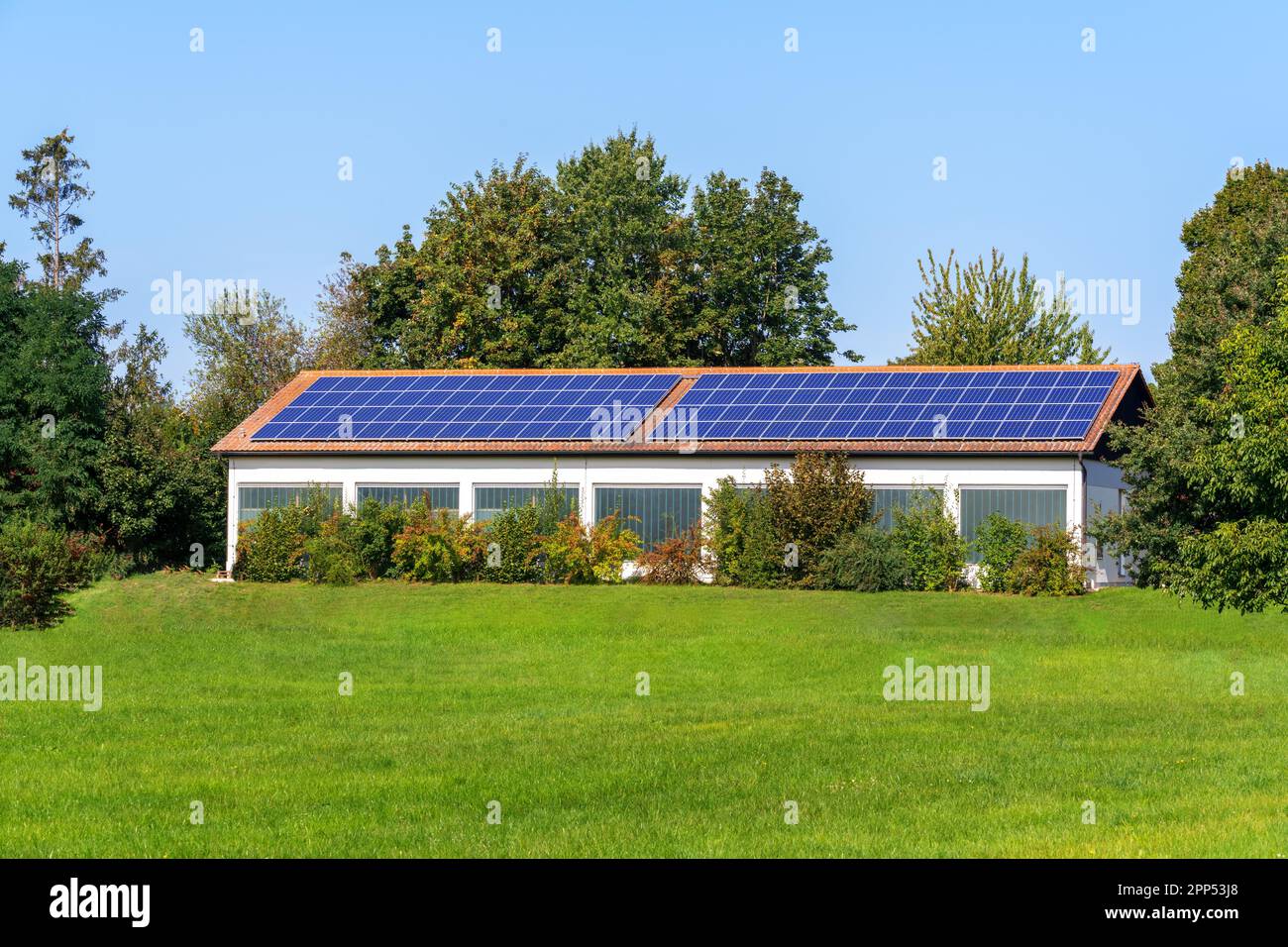 Green energy with solar collectors on the roof of an agricultural ...