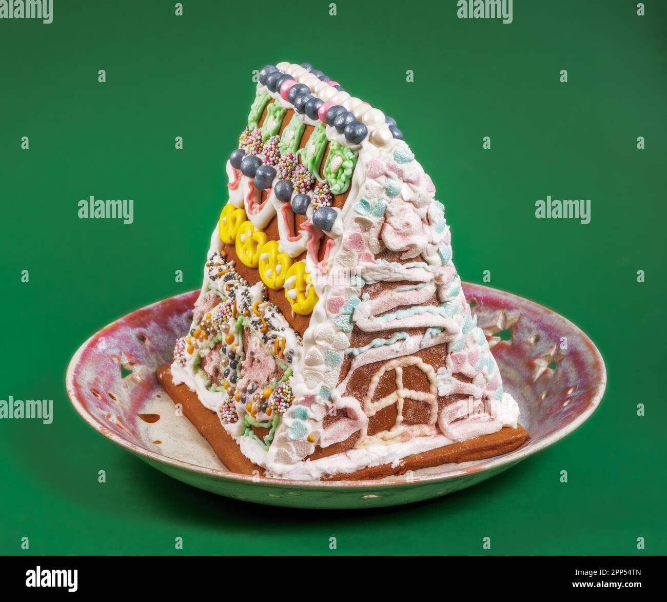 Traditional ginger bread house on a plate Stock Photo