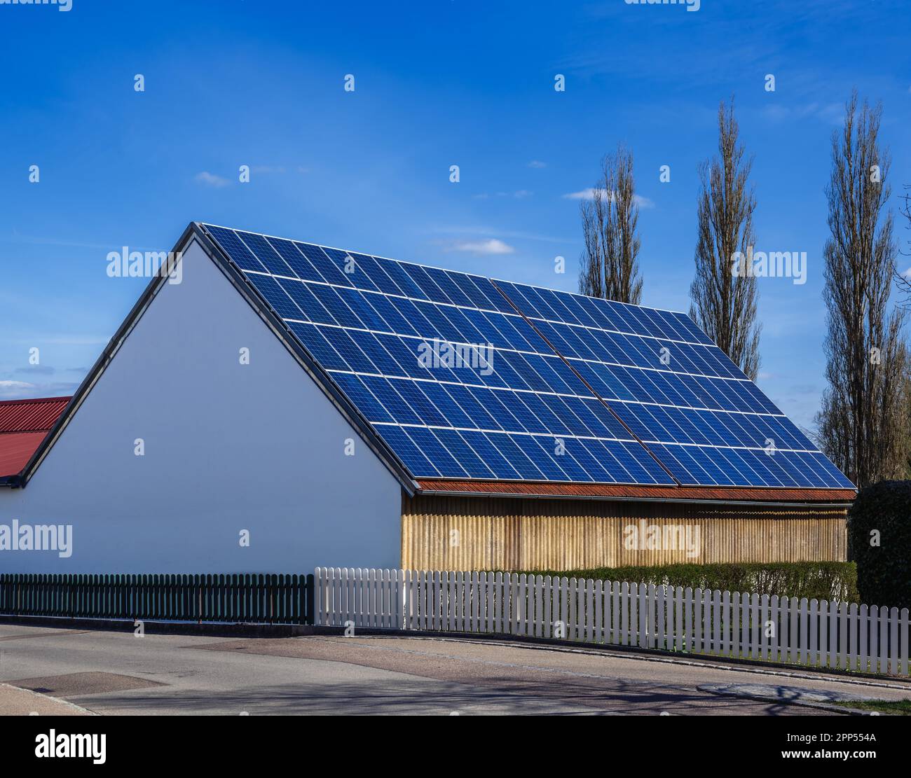 Green energy with solar collectors on the roof of an agricultural ...