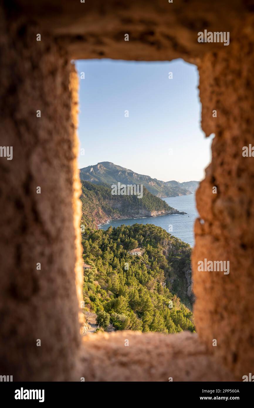 View from embrasure at Torre des Verger, stone tower on the coast, sea view, Banyalbufar, Majorca, Balearic Islands, Spain Stock Photo