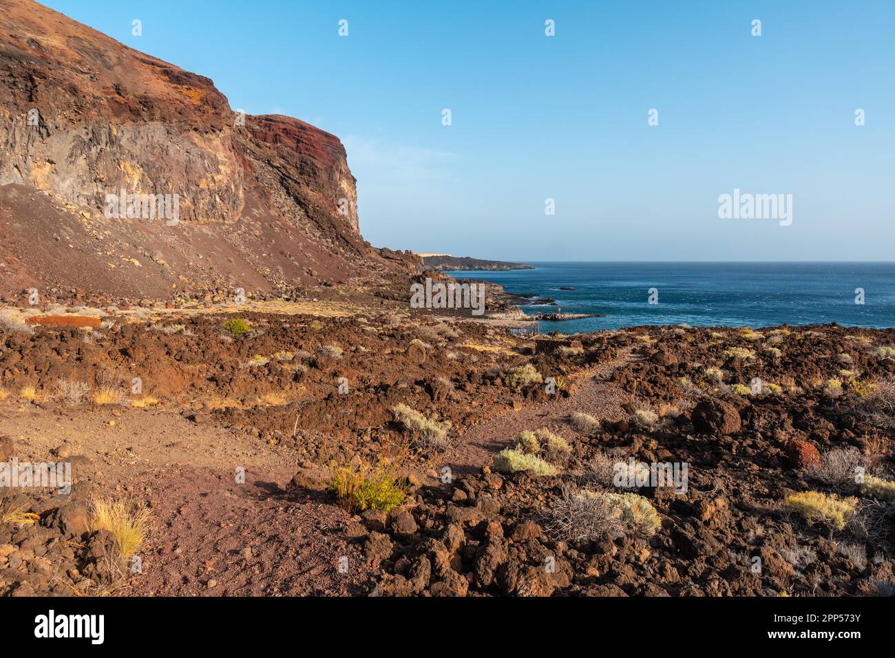 Volcanic path on the beach of Tacoron in El Hierro to go down to the recreational area, Canary Islands Stock Photo
