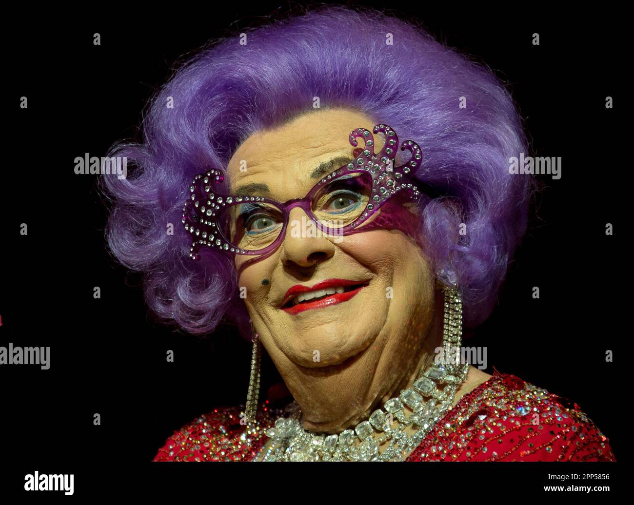 FILE - Australian TV presenter Barry Humphries performs on stage as ...