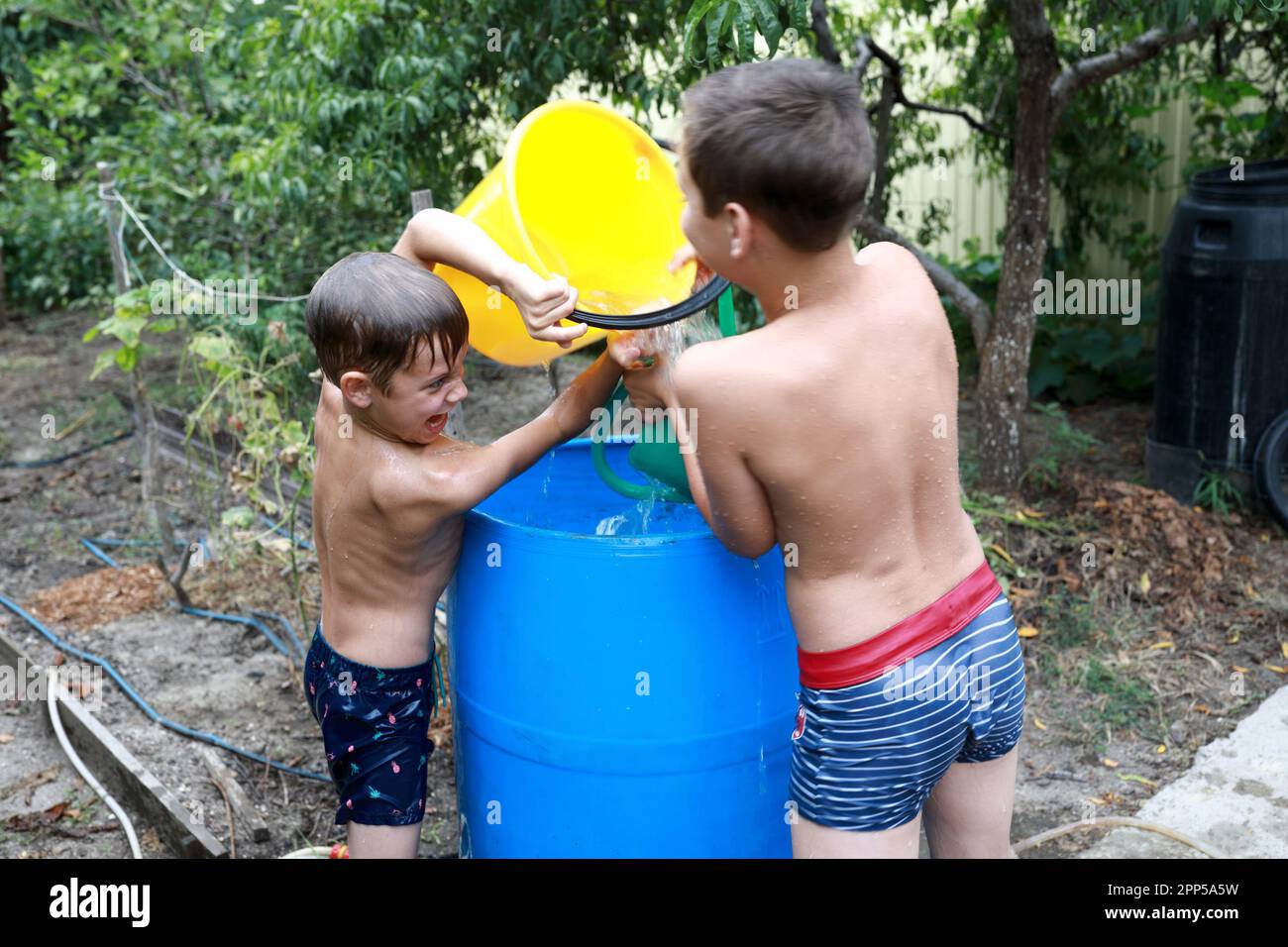 Two boys water park in hi-res stock photography and images - Alamy