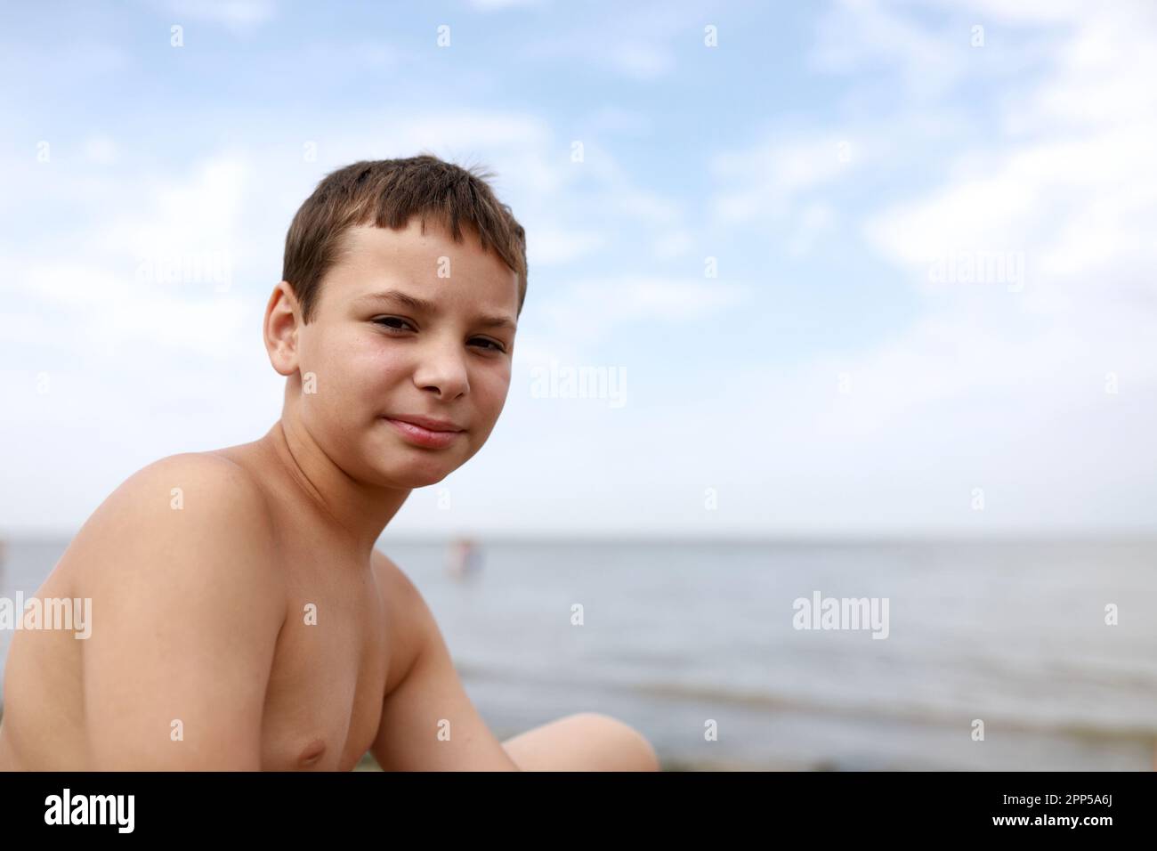 Portrait of child on shore of Azov Sea Stock Photo - Alamy