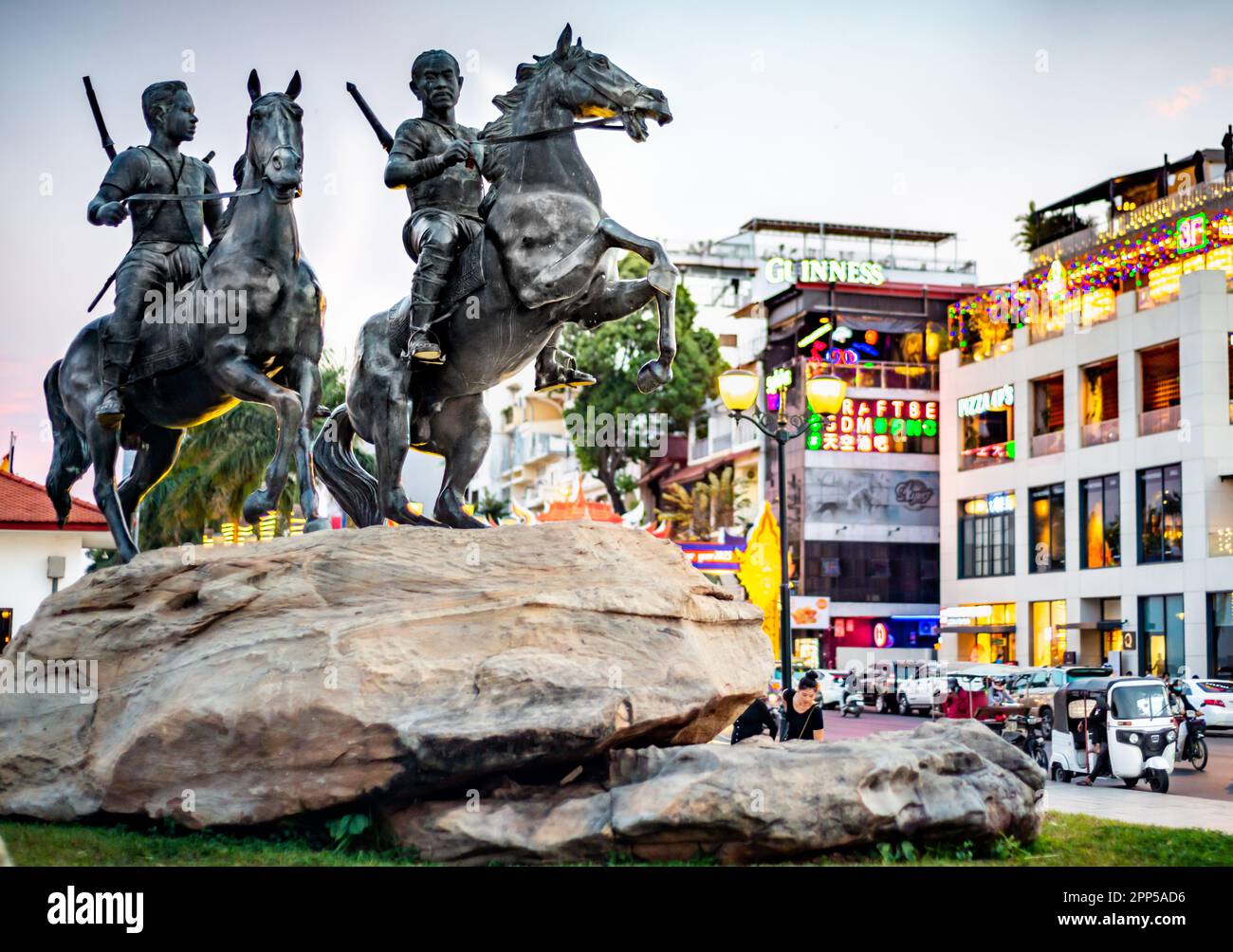 Phnom Penh,Cambodia-January 4th 2023:Mounted on a large rock,along the Riverside walk.A depiction of two heroic,historic Khmer warriors,on horseback r Stock Photo