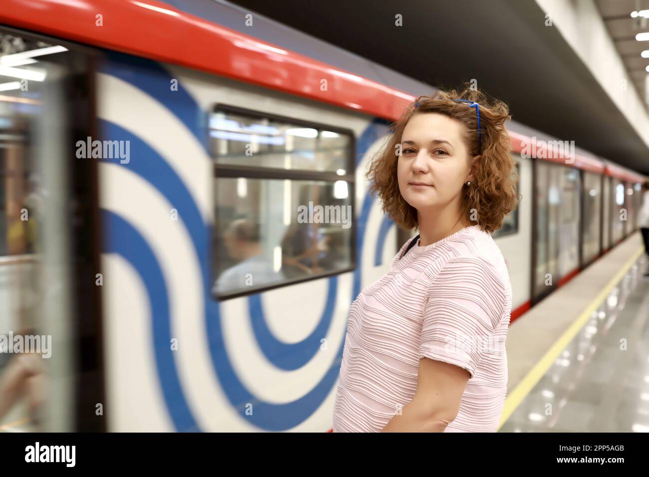 Indoor portrait woman on subway hi-res stock photography and images - Alamy