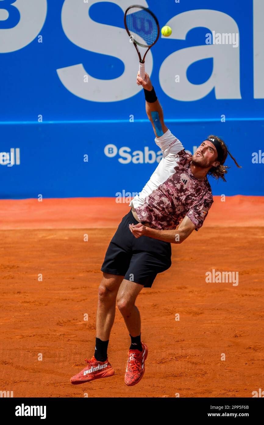 Stefanos Tsitsipas, of Greece, returns the ball to Lorenzo Musetti, of Italy, during a semi final open tennis tournament, in Barcelona, Spain, Saturday, April 22, 2023