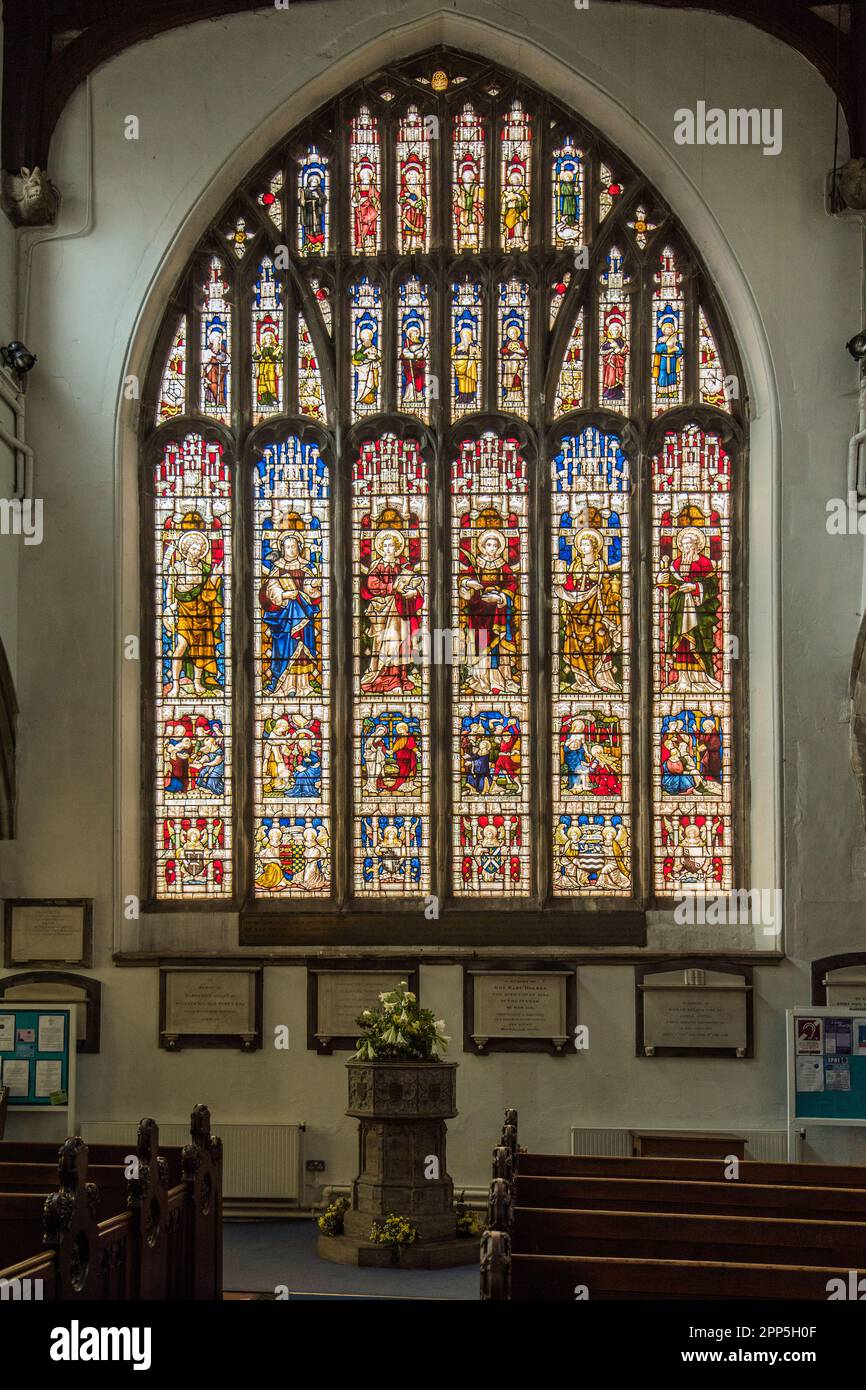 The West stained glass window at All Saints’ Church  Church of England, situated in Stamford, Lincolnshire, England. It is a Grade I listed building. Stock Photo