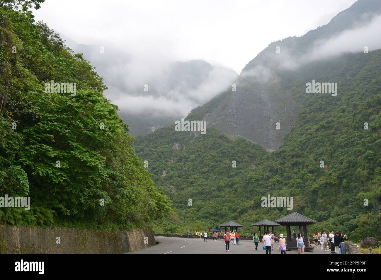Tourists visiting Taroko green mountain gorge at Taroko National Park, a very famous travel destination in Hualien, Taiwan Stock Photo