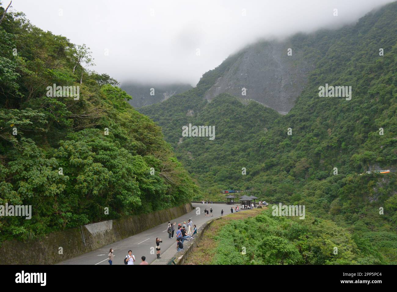 Tourists visiting Taroko green mountain gorge at Taroko National Park, a very famous travel destination in Hualien, Taiwan Stock Photo