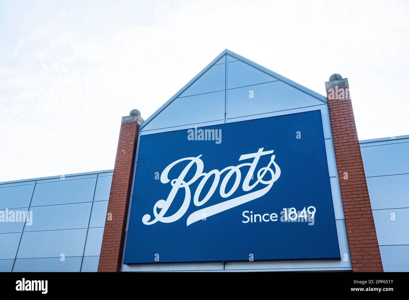 Boots the chemist sign or logo on outside wall UK Stock Photo