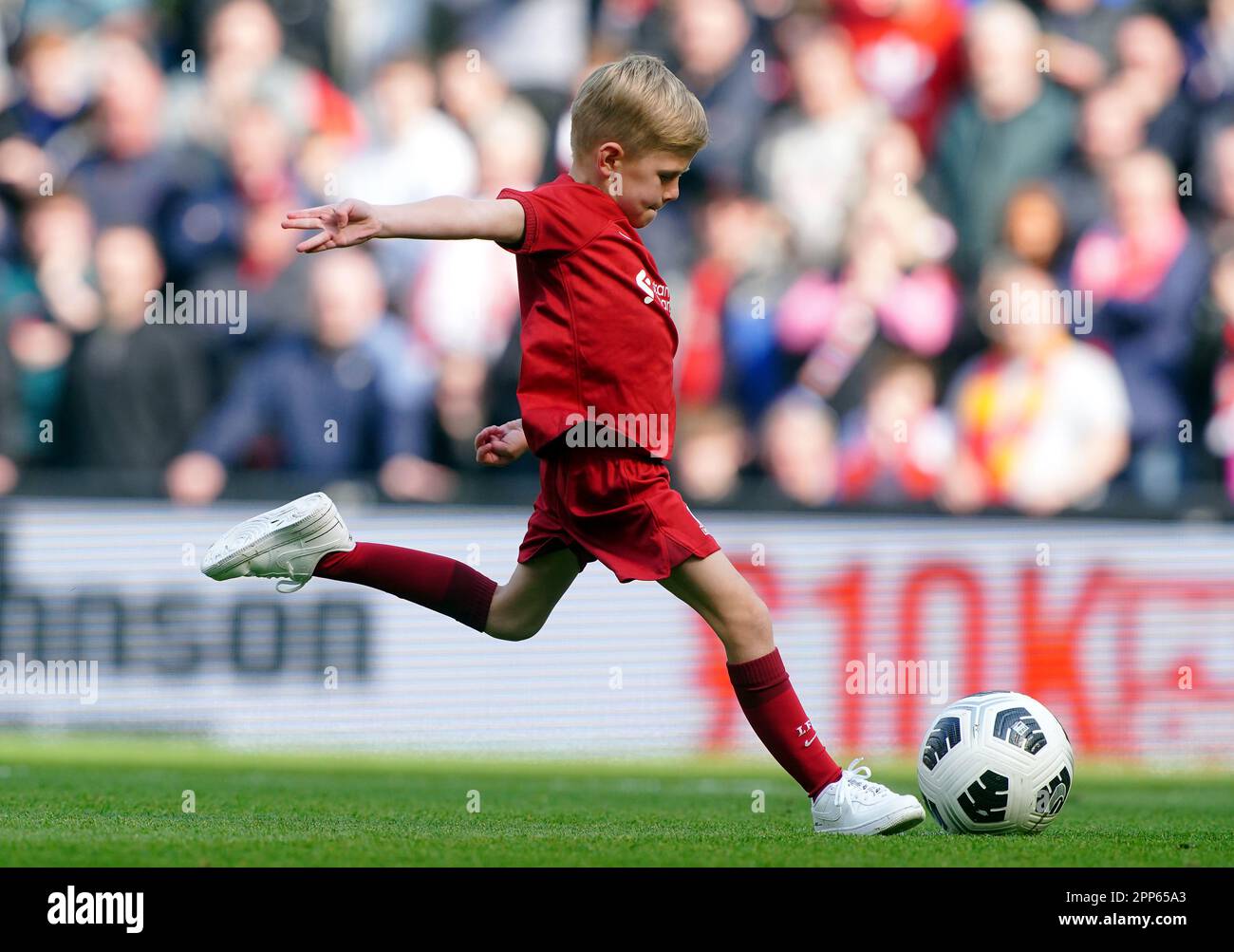 Steven Gerrard's son, Lio, scoring a penalty at half time, during the Premier League match at Anfield, Liverpool. Picture date: Saturday April 22, 2023. Stock Photo