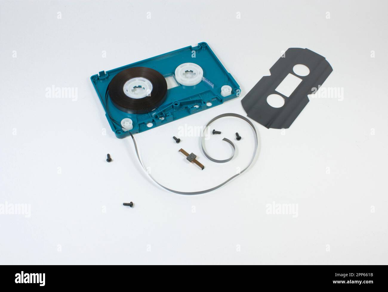 parts of cassette tape on white background Stock Photo - Alamy